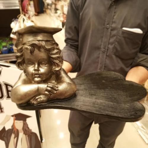 قاعدة مع مجسم تخرج مقاس 35في25سم