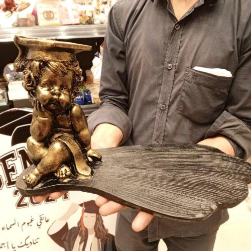 قاعدة مع مجسم تخرج مقاس 35في25سم