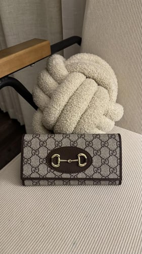 محفظة قوتشي