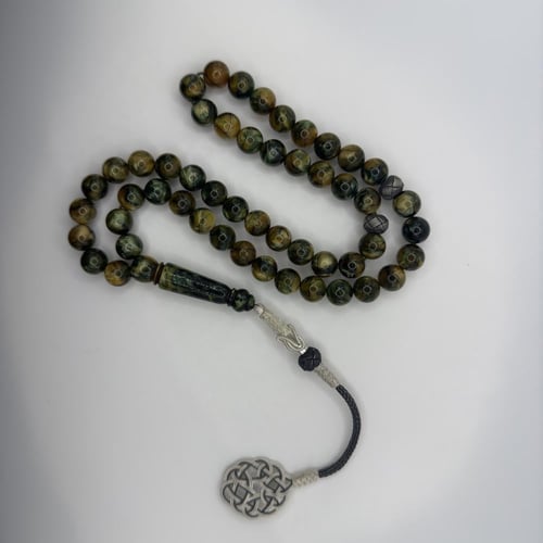 سبحه من البكلايت باللون العشبي بتموج صدفي لامع بتف...