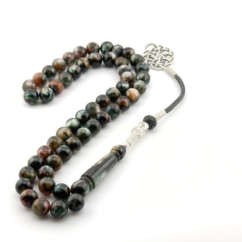 سبحه من البكلايت باللون الزيتي بتموج صدفي لامع بخر...