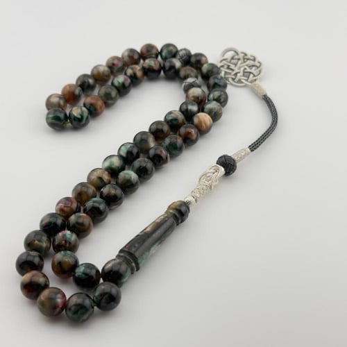 سبحه من البكلايت باللون الزيتي بتموج صدفي لامع بخر...