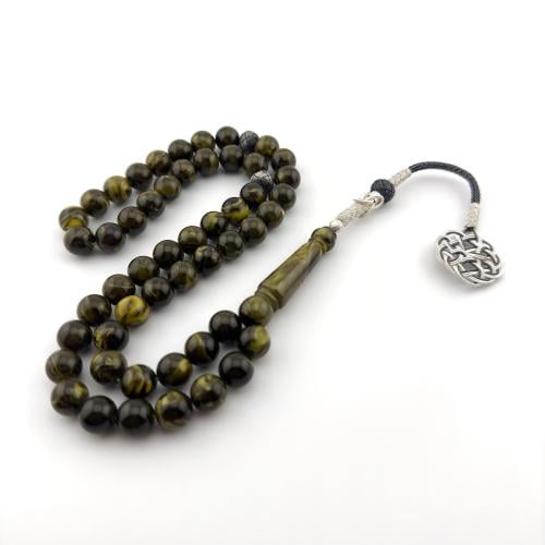 سبحه من البكلايت باللون الزيتي بتعريقه خضراء بتفاس...