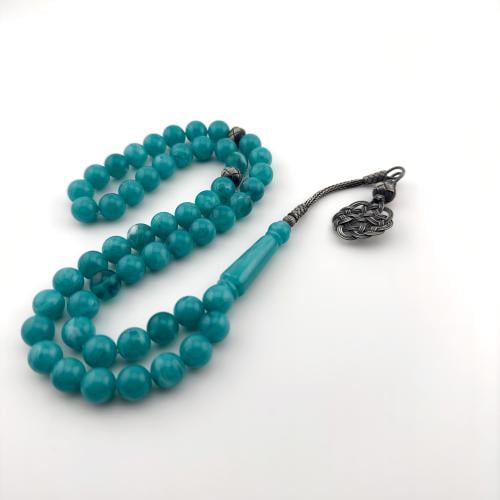 سبحه من البكلايت باللون السماوي بتعريقه زرقاء بتفا...