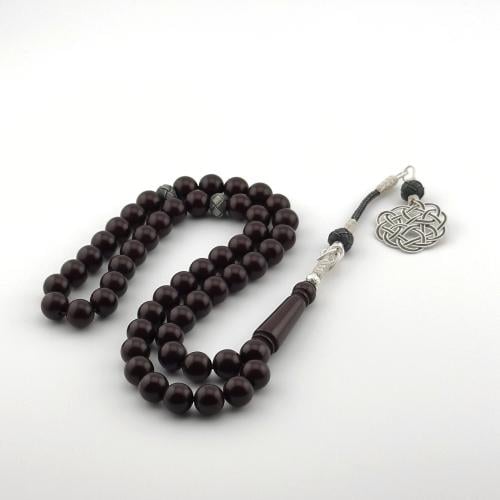 سبحه من البكلايت باللون البني الغامق بتفاسير وطربز...