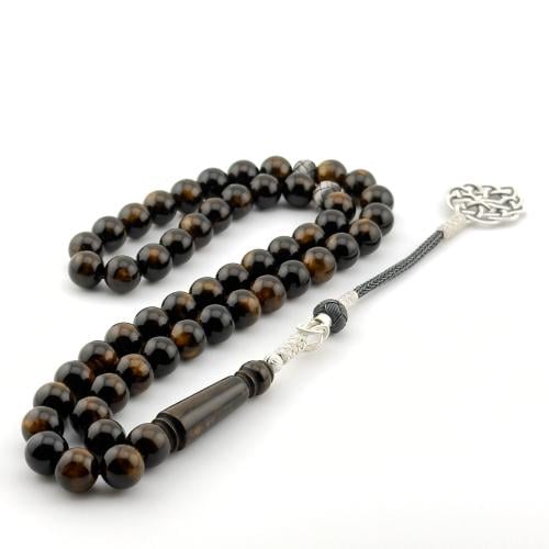 سبحه من البكلايت باللون الاسود بتعريقه ذهبيه بتفاس...