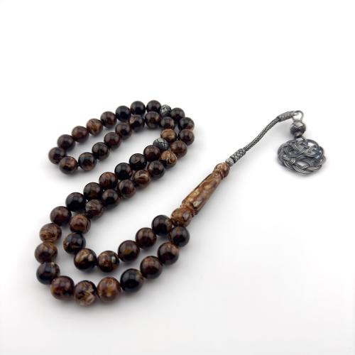 سبحه من البكلايت باللون الدارسيني بتفاسير وطربزونه...