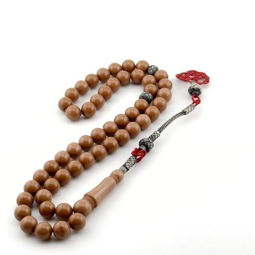 سبحه من البكلايت باللون البني الفاتح بتفاسير وطربز...