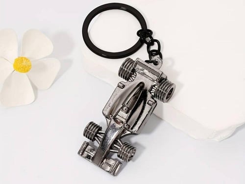 A Creative F1-Style Golden Race Car Keychain Silve...