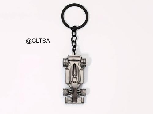A Creative F1-Style Golden Race Car Keychain Silve...
