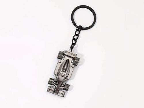 A Creative F1-Style Golden Race Car Keychain Silve...