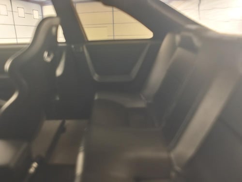 GReddy Nissan GT-R (BCNR33) Red Metallic 1:18 Igni...