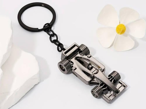 A Creative F1-Style Golden Race Car Keychain Silve...
