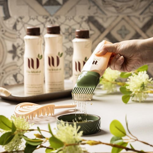 عبوة الزيت المثالي + موزع الشعر هدية