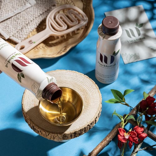 عبوة الزيت المثالي + موزع الشعر هدية