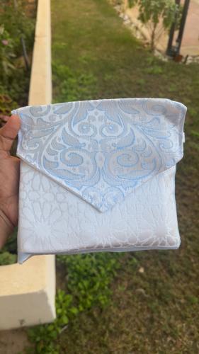 شنطة مع سجادة