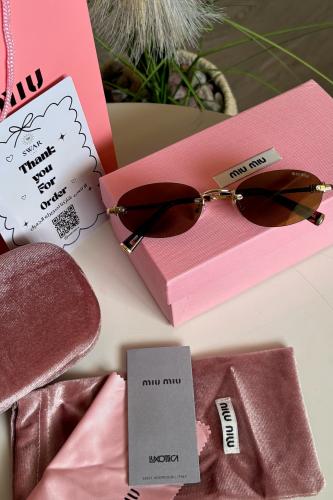 نظارة miu miu اطراف تايقر