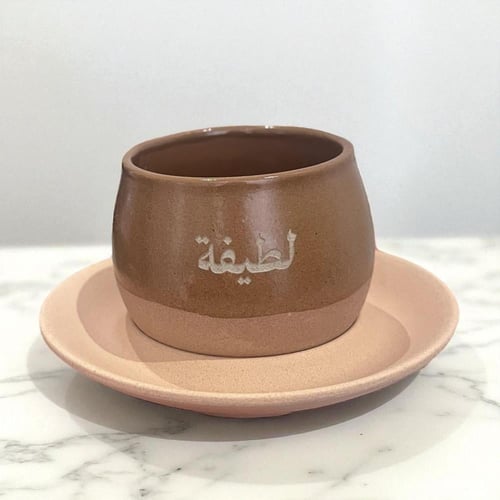 كوب سيفين ونخلة