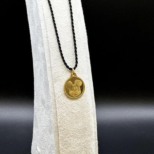 جنيه ميكي ماوس مع التعليقة وزن 4.35 قرام عيار 24