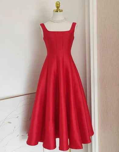 فستان كلوش بكسرات