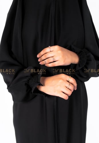 عباية رأس والكم زم منفوش