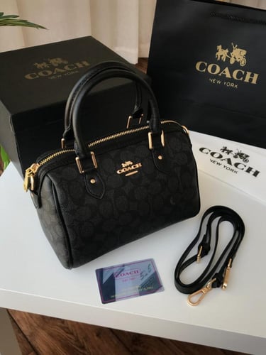 شنط كوتش بعلبة الماركة