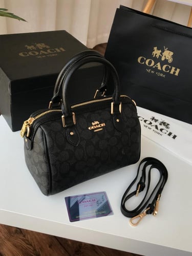 شنط كوتش بعلبة الماركة