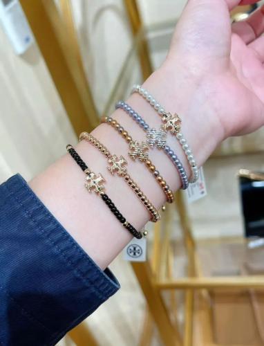 سوار نسائي من Tory Burch