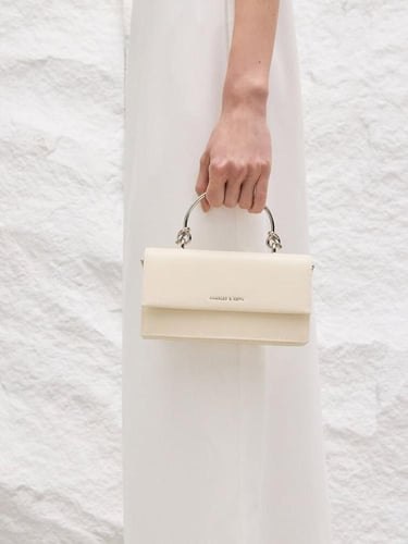 حقيبة كريستين من تشارلز لون كريمي