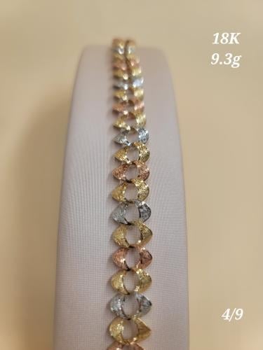 Colored chain gold bracelet worn on both plain and...