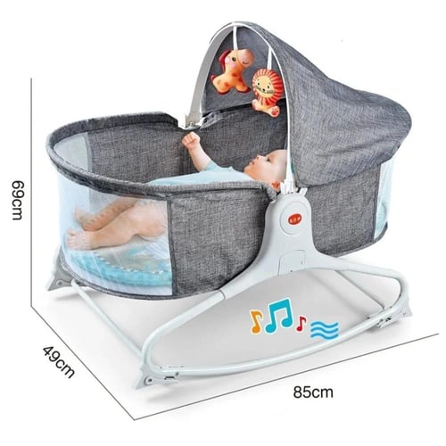 سرير اطفال هزاز مع العاب