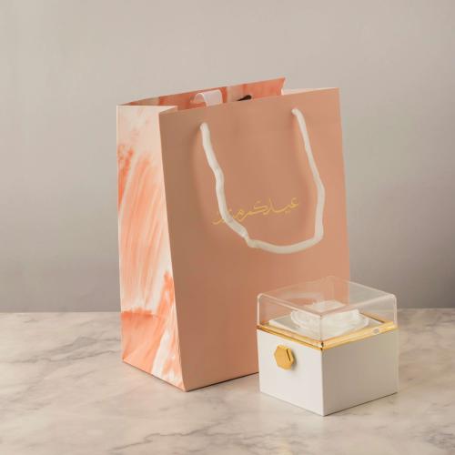 أكياس فاخرة للعيد لون وردي وختم "عيدكم مبارك /العد...