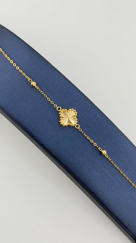 اسوارة ذهب تصميم وردة