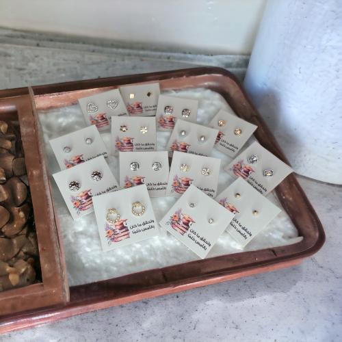 أقراط أذن مع ثيم التخرج