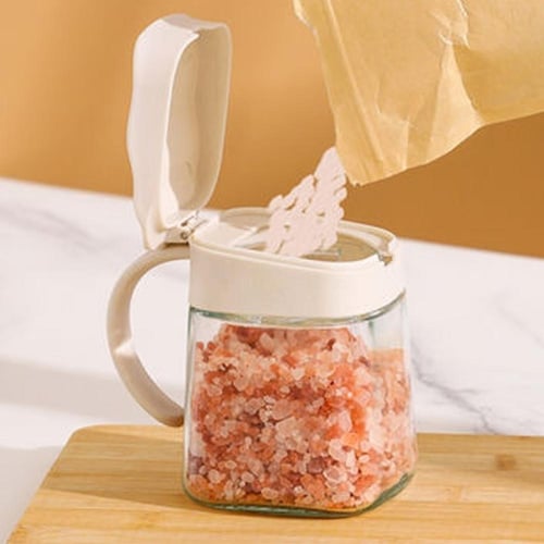 حافظة بهارات زجاج غطاء بلاستيك مع ملعقة بلاستيك