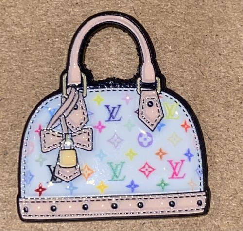 ملصق حديد شنطة LV