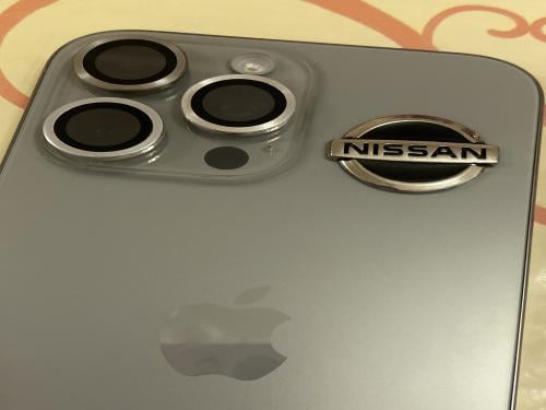 Metallic sticker with Nissan logo