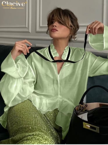 قميص نسائي أبيض فضفاض