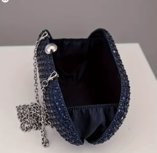 حقيبة كلاتش للسهرة بتصميم بيضاوي