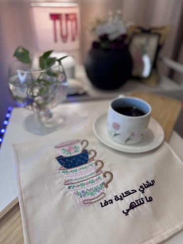 Embroidery tablecloth suitable for a warm tea session