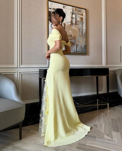 فستان اصفر أنيق بكلفه ترتر ورد