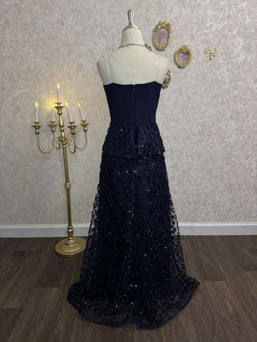 فستان فريال الكحلي