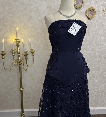 فستان فريال الكحلي