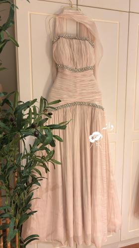 Elegant evening dress decorated with crystals