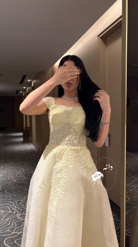 Luxurious evening dress with yellow embroidery