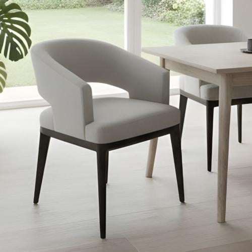 A padded dining chair with a comfortable modern design