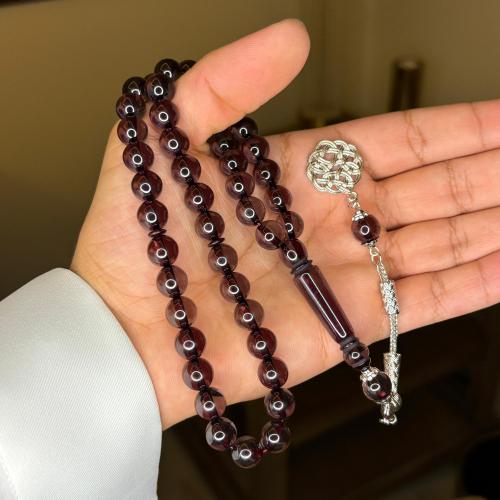 سبحة بكلايت كبدي شفاف مع خيط اسود