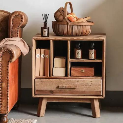 A wooden cabinet with drawers and shelves