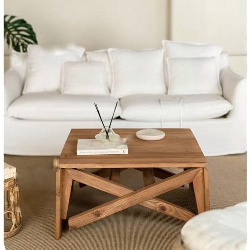 Wooden table that can be folded and converted