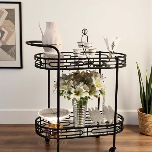 عربه تقديم بلون اسود واسطح مرايه بتصميم انيق وعصري